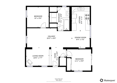 A floor plan of a home with a living room, dining room, kitchen, and two bedrooms.